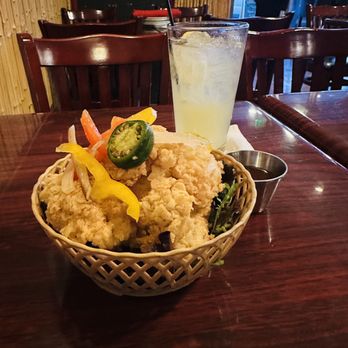 Vanessa's Bistro - Salt & Pepper fried tender calamari garnished with organic salad and sautéed bell peppers, chilis and onions, spicy lime dipper sauce $12 - Vietnamese Near Me - Berkeley, California