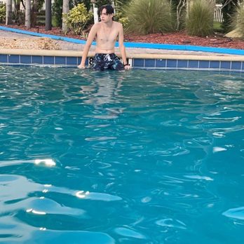Encore Tropical Palms - My son in the pool - RV Parks Near Me - Kissimmee, Florida
