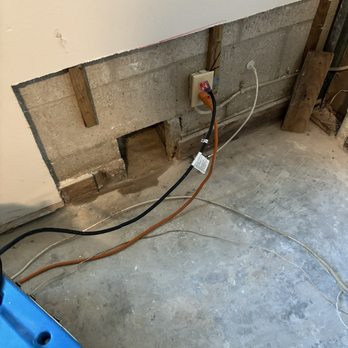 Dave 21 - Interior wall cut - detection crew gained access to the cement cracks - temporary seal applied to stop massive water intrusion - Plumbing Near Me - Oakland Park, Florida