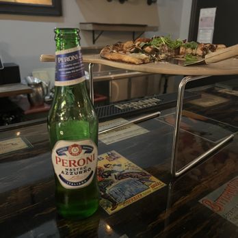 Ristorante Ottaviani - a bottle of beer and a pizza - Italian Near Me - Cumberland, Maryland Ristorante Ottaviani - a bottle of beer and a pizza - Italian Near Me - Cumberland, Maryland