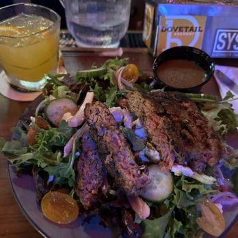 Flat Iron Tap - Lamb patty on a Greek salad! - Burgers Near Me - Lake Geneva, Wisconsin