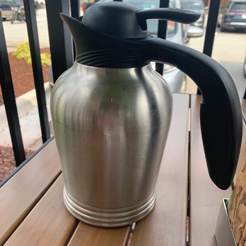 First Watch - a coffee pot on a wooden table - Breakfast & Brunch Near Me - Jacksonville, North Carolina