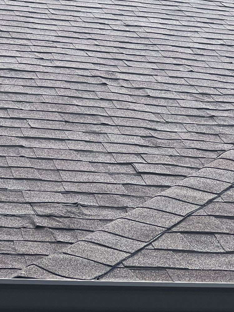 Slide of Tucker Roofing Systems