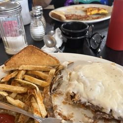 Vaqueros - Chicken fried steak!!! And hubby has western omelette with hash brown !!