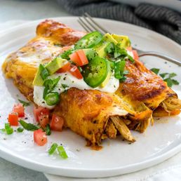 a plate of enchiladas a plate of enchiladas