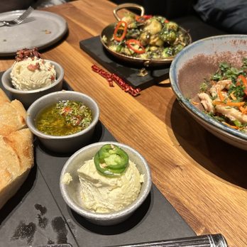 Baldamar - Bread is Life, Brussels Sprouts, Calamari - New American Near Me - Roseville, Minnesota Baldamar - Bread is Life, Brussels Sprouts, Calamari - New American Near Me - Roseville, Minnesota
