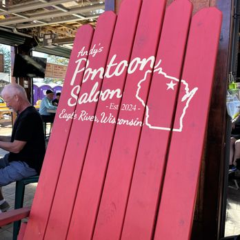 Andy's Pontoon Saloon - Monster Adirondack Chair by the bar. Adirondack is the word of the day. :P - Beer Gardens Near Me - Eagle River, Wisconsin