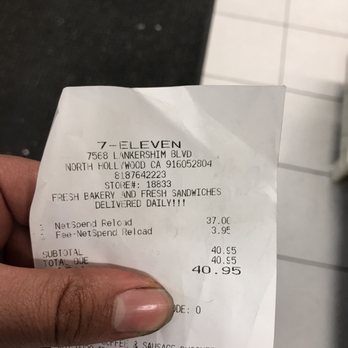 7-Eleven - a person's hand holding a receipt - Convenience Stores Near Me - North Hollywood, California 7-Eleven - a person's hand holding a receipt - Convenience Stores Near Me - North Hollywood, California