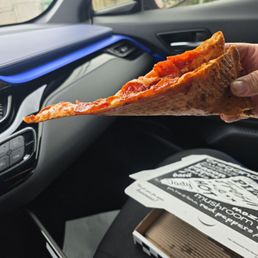 Pepperoni slice...look how it folds..excellent pizza Pepperoni slice...look how it folds..excellent pizza