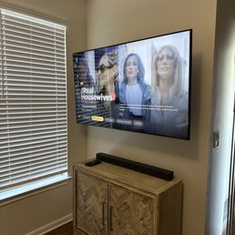65" hung in our living room with a full motion mount.