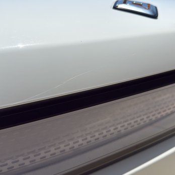 Soapy Joe’s - Photo taken after I attempted to lightly polish the area myself. The long scratch is still clearly visible. - Car Wash Near Me - San Diego, California