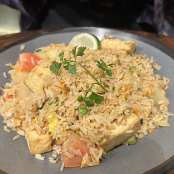 Spoon at Paper Plane - Pineapple Fried Rice with Tofu n Veggies - Thai Near Me - Hapeville, Georgia Spoon at Paper Plane - Pineapple Fried Rice with Tofu n Veggies - Thai Near Me - Hapeville, Georgia