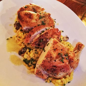 Left Bank - Farm Raised chicken on a bed of what may be the best corn ever. - New American Near Me - New York, New York Left Bank - Farm Raised chicken on a bed of what may be the best corn ever. - New American Near Me - New York, New York