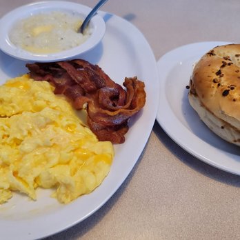 JP's Bagel Place - Scrambled eggs with cheese, bacon and grits, with a garlic bagel. - Bagels Near Me - Hollywood, Florida JP's Bagel Place - Scrambled eggs with cheese, bacon and grits, with a garlic bagel. - Bagels Near Me - Hollywood, Florida