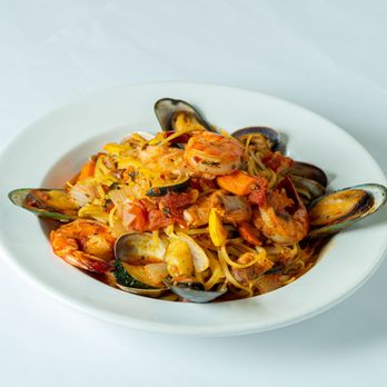 Mama Mia's - a plate of pasta with shrimp and musselling - Italian Near Me - Gilroy, California Mama Mia's - a plate of pasta with shrimp and musselling - Italian Near Me - Gilroy, California