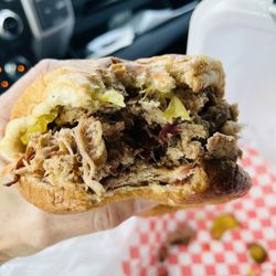 JDs Smokehouse - Pulled pork with vinegar bbq sauce and extra pickles.