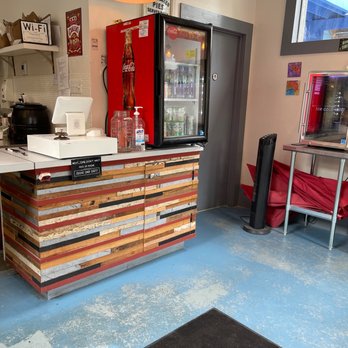 Empanola - Pay station, drink cooler & restroom door - Empanadas Near Me - New Orleans, Louisiana