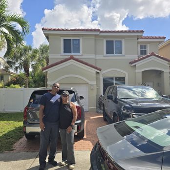 Good Guy Roofing - Homeowners showing off their new roof!! - Roofing Near Me - Pompano Beach, Florida