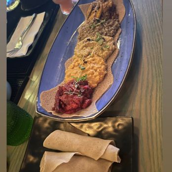 Ras Plant Based - I forgot what this was lol. It comes with two more Injera Roll and then we ordered two more as it wasn't enough. - Ethiopian Near Me - Brooklyn, New York