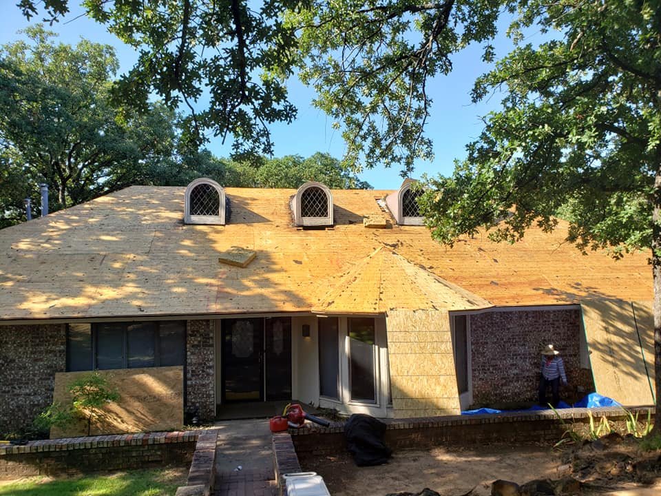 Slide of Cowtown Roofing