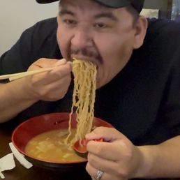 My friend Matt eating ramen. My friend Matt eating ramen.