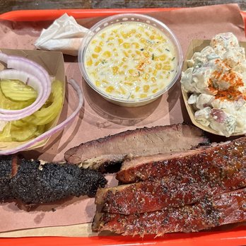 Terry Black's Barbecue - Cream corn, potato salad, beef brisket and ribs - Barbeque Near Me - Austin, Texas