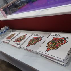 Lou Malnati's Pizzeria - Five carryout thin pizzas from this location.