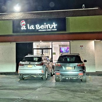 A La Beirut - two cars parked in front of a restaurant - Lebanese Near Me - Los Angeles, California