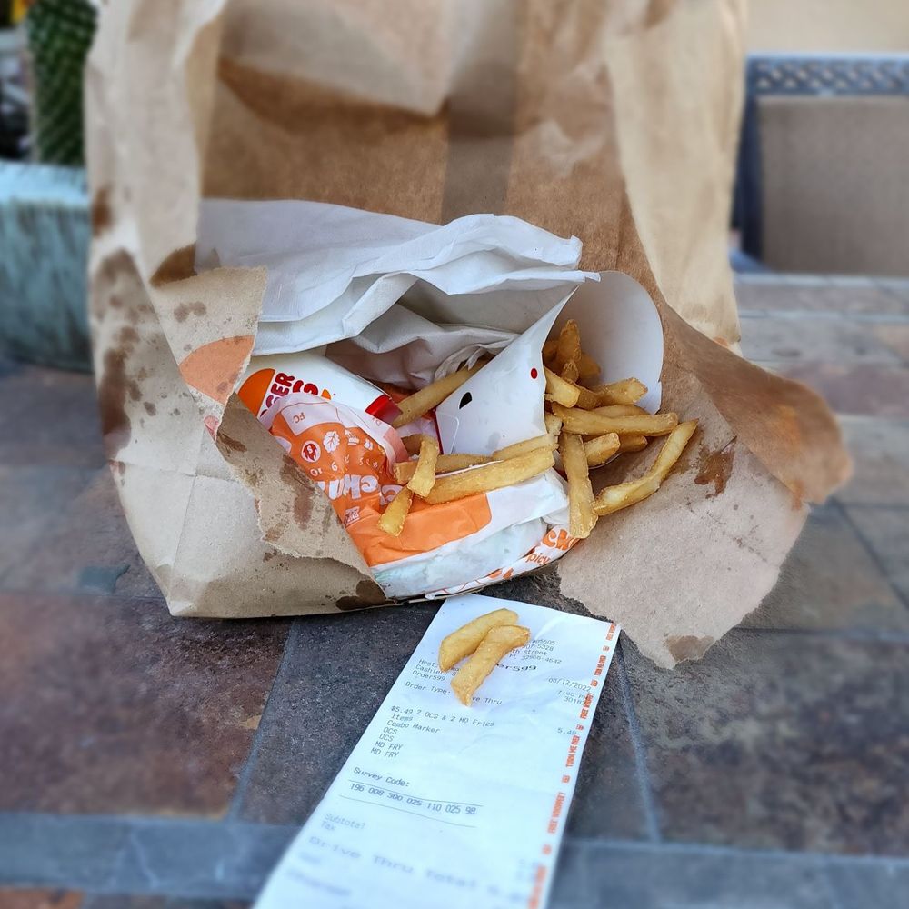 french fries in a paper bag french fries in a paper bag