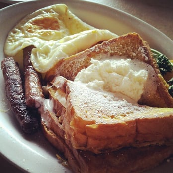 Cafe Cup - Stuffed French toast (with eggs anyway and choice of sausage or bacon) - Breakfast & Brunch Near Me - Huntington Beach, California Cafe Cup - Stuffed French toast (with eggs anyway and choice of sausage or bacon) - Breakfast & Brunch Near Me - Huntington Beach, California