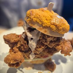 Cafe De Hong Kong - #104 - fried chicken, avocado, lettuce, tomato, spicy sauce on pineapple bun.