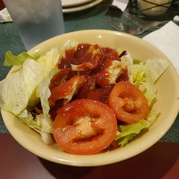 Modo Mio Italian Restaurant - Salad with tomato basil dressing. - Italian Near Me - McAlester, Oklahoma Modo Mio Italian Restaurant - Salad with tomato basil dressing. - Italian Near Me - McAlester, Oklahoma