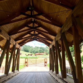 Halter Ranch - Driving across the covered bridge on the way up to the tasting room. - Wineries Near Me - Paso Robles, California