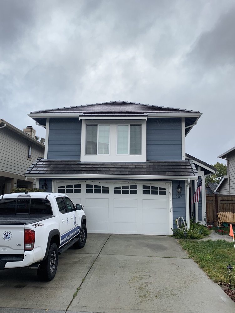 Slide of R E Roofing & Construction