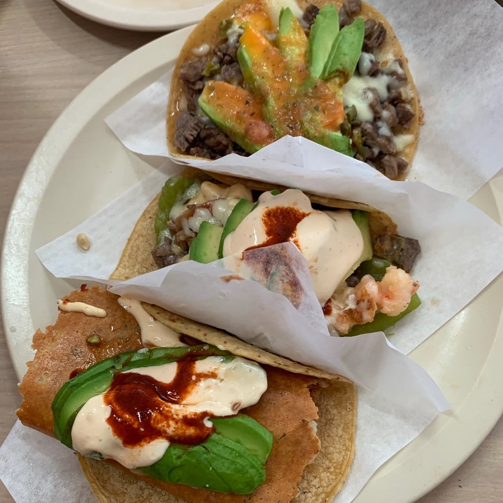 Left to right- Quesataco with arrecherra and shrimp jalapeño salseado New York and taco de nopal