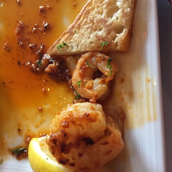 Sangria Y Tapas - Tapa: Gambas al Ajilo, shrimp in garlic sauce. My dining buddies didn't wait for me to take photo before helping themselves - Tapas Bars Near Me - Westlake, Ohio Sangria Y Tapas - Tapa: Gambas al Ajilo, shrimp in garlic sauce. My dining buddies didn't wait for me to take photo before helping themselves - Tapas Bars Near Me - Westlake, Ohio
