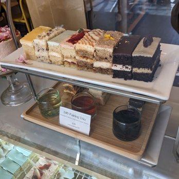 Cake Bloom - Cake slices in the case - Bakeries Near Me - Charlottesville, Virginia Cake Bloom - Cake slices in the case - Bakeries Near Me - Charlottesville, Virginia