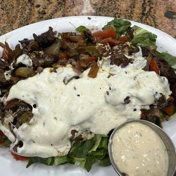 Shish Grill - Philly Cheesesteak without the bun sitting on a bed of greens. - Mediterranean Near Me - San Ramon, California