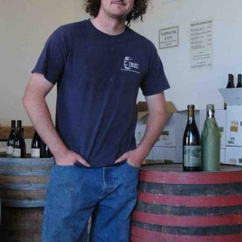 Odonata Wines - a man standing in front of a barrel - Wineries Near Me - Salinas, California Odonata Wines - a man standing in front of a barrel - Wineries Near Me - Salinas, California
