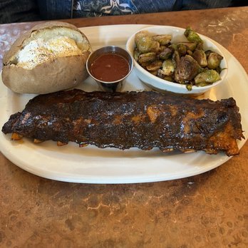 Outwest - Ribs, Brussel sprouts , and a baked - Steakhouses Near Me - Kernersville, North Carolina Outwest - Ribs, Brussel sprouts , and a baked - Steakhouses Near Me - Kernersville, North Carolina