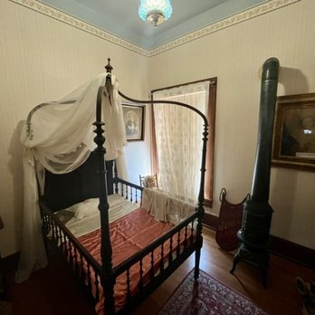 Madison County Historical Society - Notice the wood-burning stove right next to the crib. How could that not be dangerous? - Museums Near Me - Winterset, Iowa Madison County Historical Society - Notice the wood-burning stove right next to the crib. How could that not be dangerous? - Museums Near Me - Winterset, Iowa