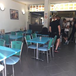 Interior of the restaurant. Many people coming in and out while we sat and ate. Take away option is great to have if it is hot out! Interior of the restaurant. Many people coming in and out while we sat and ate. Take away option is great to have if it is hot out!