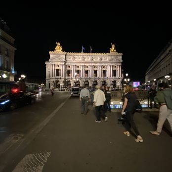 Café de la Paix - if you sit outside, You will have a great view of the Paris Opera House.  The restaurant is depicted on the left - French Near Me - Paris, 75