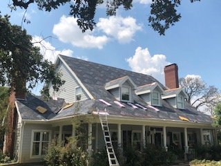 Slide of Tiger Roofing