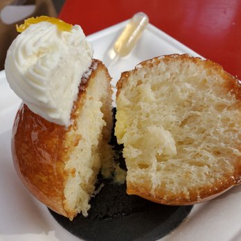 Moulin - A look inside the Baba au Rhum ($7.50). Also a good way to set it up for dripping the rum onto the dough. Or maybe I should've injected. - Bakeries Near Me - Newport Beach, California