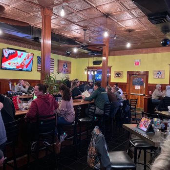Sok's Bar - Bar, dining table area. - Bars Near Me - South Hadley, Massachusetts