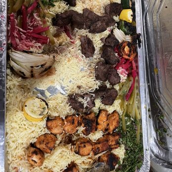 The Butcher's Grille - Sorry, We started eating before I took a picture. Meat, chicken, rice, - Middle Eastern Near Me - Dearborn, Michigan