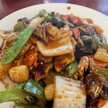 Dragon Den - Several meats and seafood in hunan sauce. - Chinese Near Me - Knoxville, Tennessee Dragon Den - Several meats and seafood in hunan sauce. - Chinese Near Me - Knoxville, Tennessee