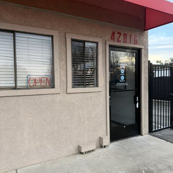 CubeSmart Self Storage - photo showing open sign, doors locked during business hours,  no sign of 'will be back'. - Self Storage Near Me - Fremont, California