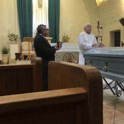 Our Lady of Solitude Catholic Church - Reading a passage from bible